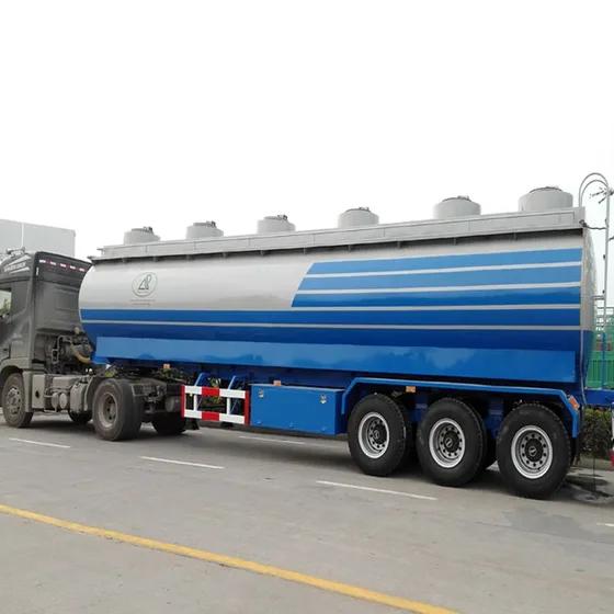 Side view showing the 12980mm length, 3-axle layout, and mechanical suspension with leaf springs
