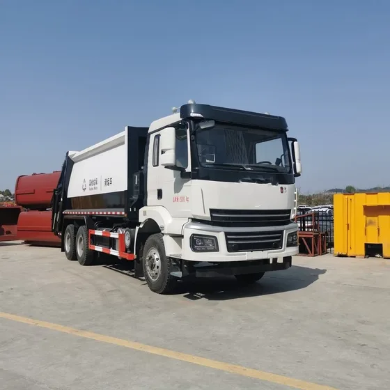 Front three-quarter view of a 6x4 compressed garbage truck with white body and red side panels