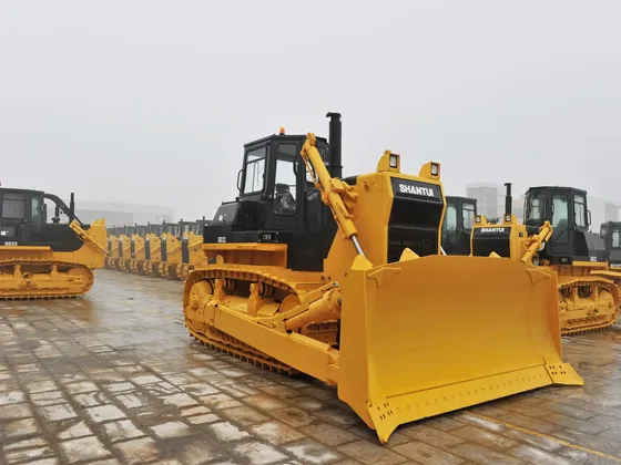Rear view of the bulldozer with the ripper shank and track assembly visible