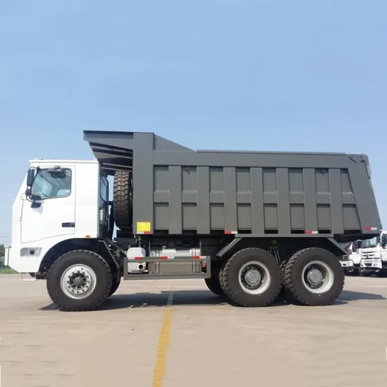 White HOWO 50-ton underground mining dump truck parked on a yard, front three-quarter view