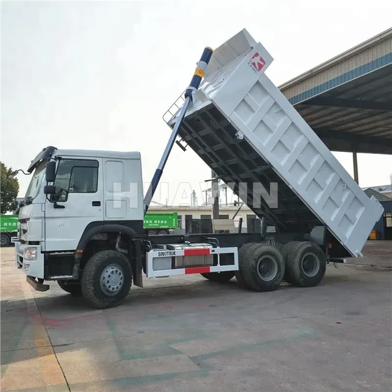 Side view of the dump truck showing the chassis and wheels