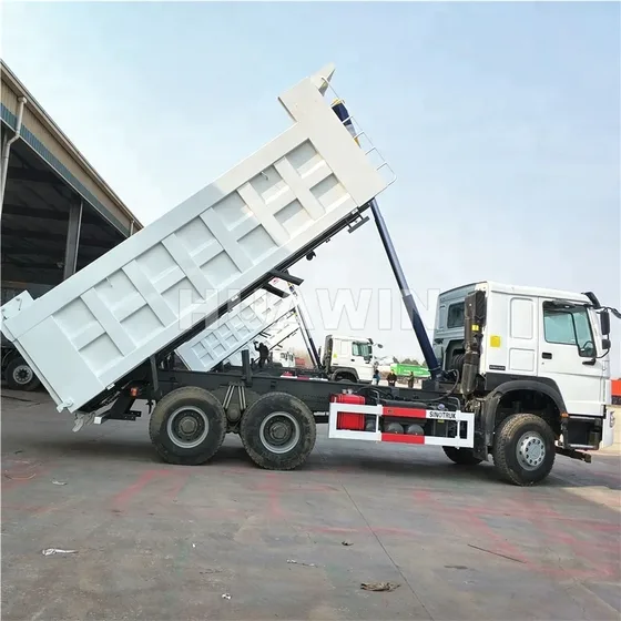 Rear view of the dump truck with the cargo box raised