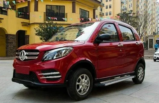Interior with LCD dashboard, manual gear shift, and four passenger seats