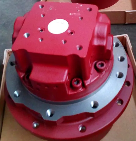 Close-up of the hydraulic piston pump housing with pressure port and connection fittings