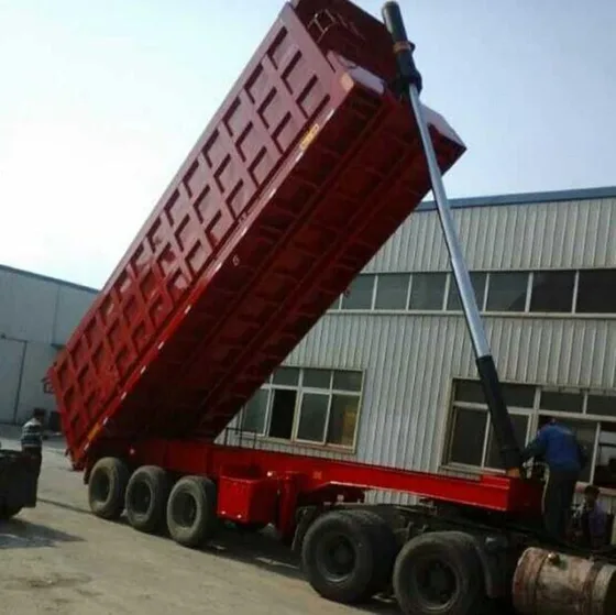 Side view of a 3-axle rear tipper semi trailer with 1200R20 tyres and leaf spring suspension