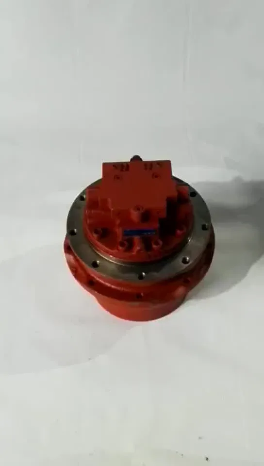 Close-up of the MAG-33V-550E-3 travel motor with visible mounting flanges and hydraulic ports