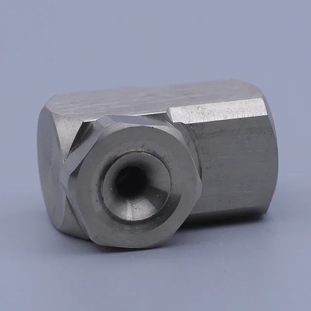 Silver stainless steel hydraulic adapter fitting with hexagonal body and female port on a grey background
