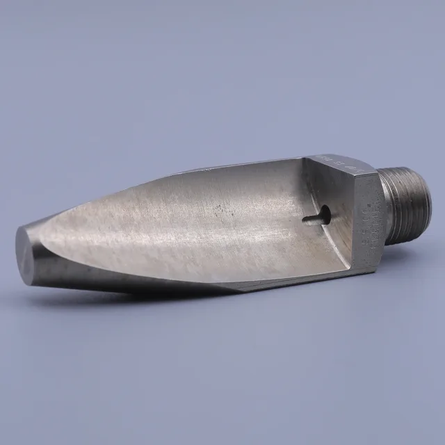 Stainless steel flat fan spray nozzle with threaded connection on a light blue background