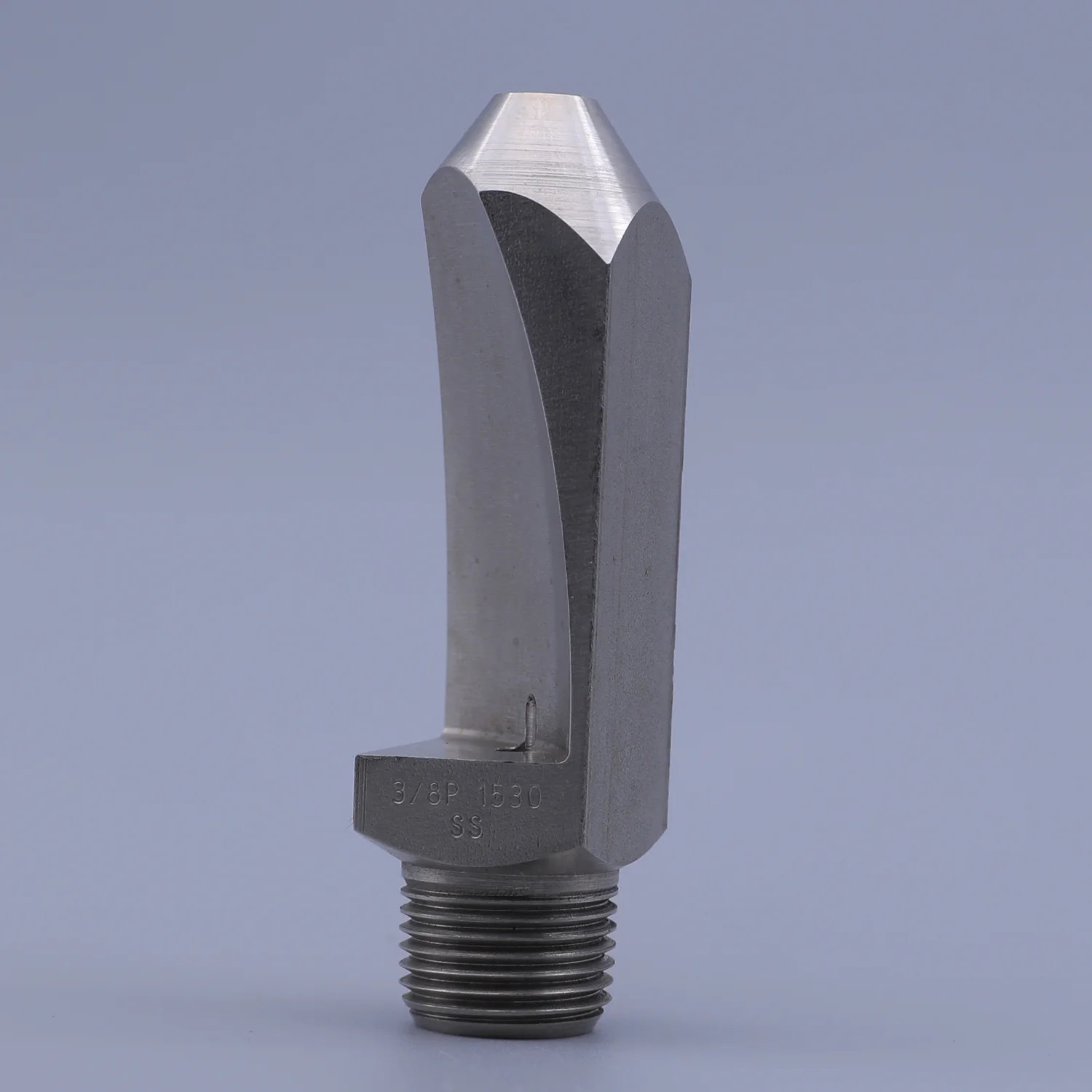 Close up of a silver metal spray nozzle with a threaded connection and a flat fan tip against a plain background