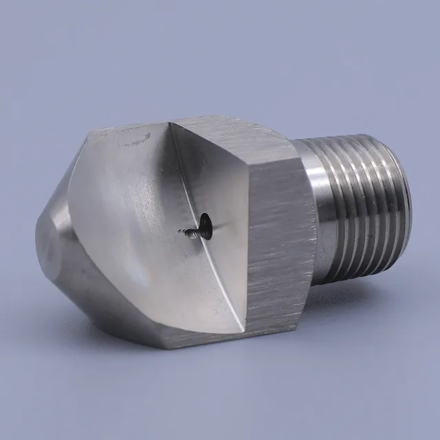 Stainless steel spray nozzle with hex body and threaded connection on blue background