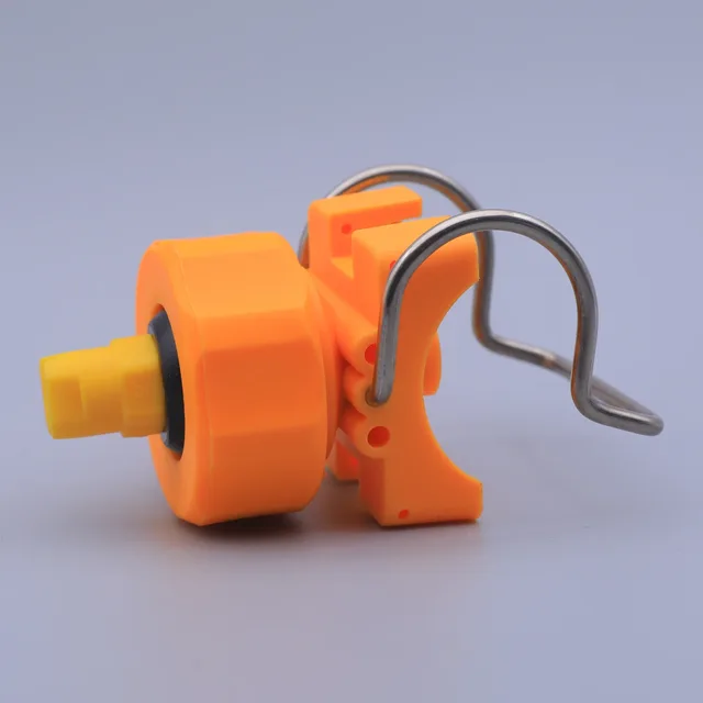 Orange plastic fuel line disconnect tool with yellow tip and metal clips