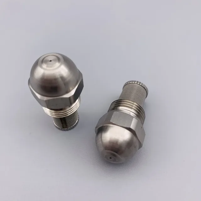 Two stainless steel spray nozzles with hex fittings and knurled collars on a gray background
