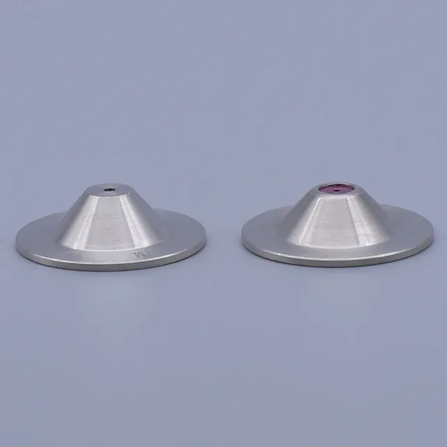 Two silver conical metal parts with circular bases shown side-by-side against a gray background