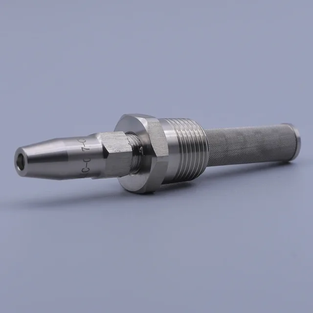 A silver metallic cylindrical tool with a knurled handle and threaded shaft
