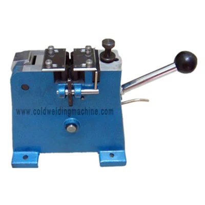 Copper wire clamped between the dies of an SGT cold pressure welding machine