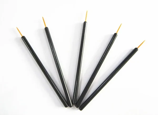 Five disposable eyeliner brushes with fine nylon tips and slim black handles