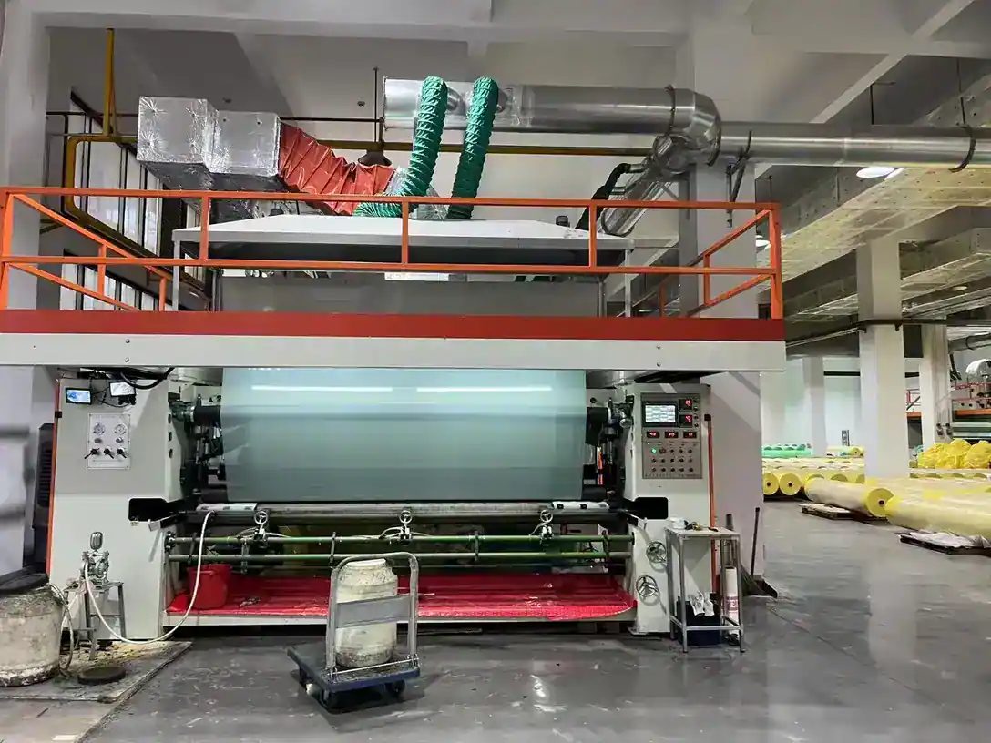 Coating line applying the adhesive layer to cotton module wrap film