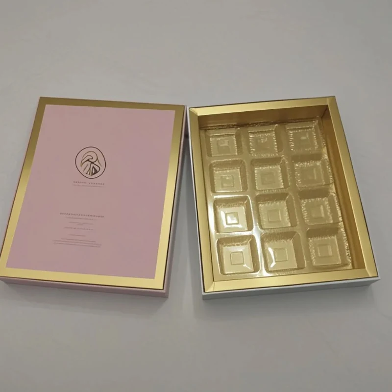 Chocolate box open showing the cavity layout