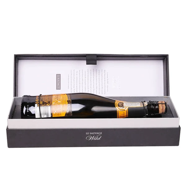 Custom wine packaging gift box closed on a dark surface