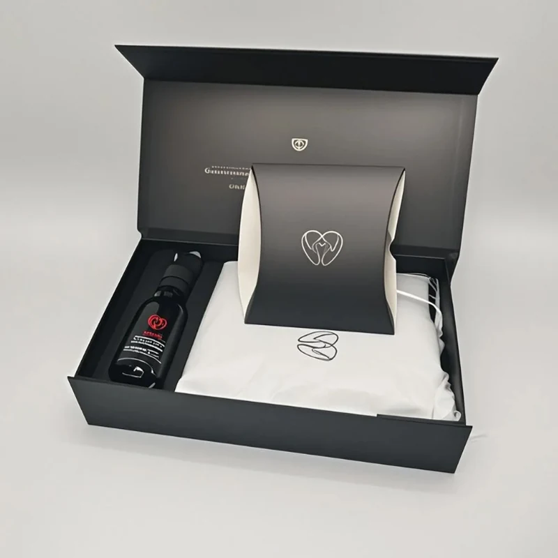 Magnetic book-shaped rigid cosmetic box open with products inside