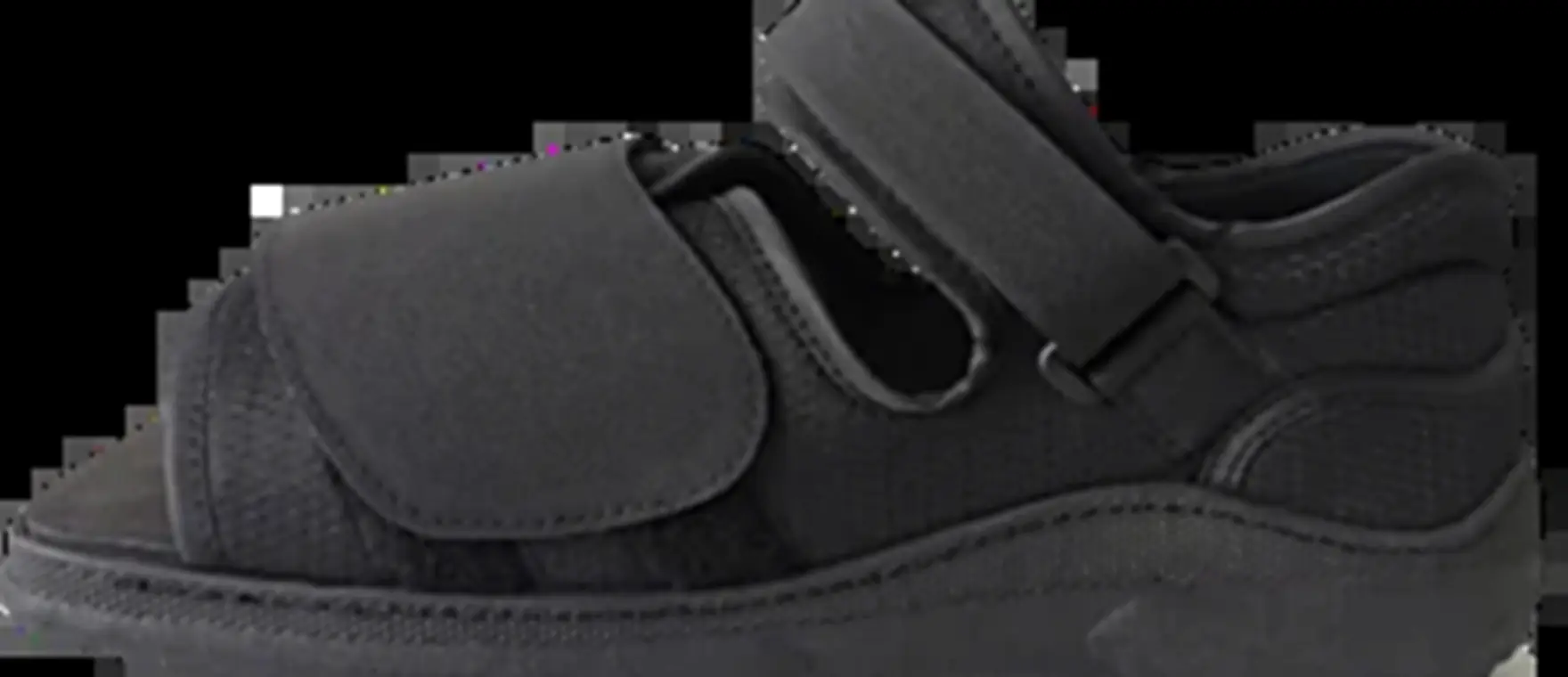 Black post-operative shoe with a square toe box and extra-long straps
