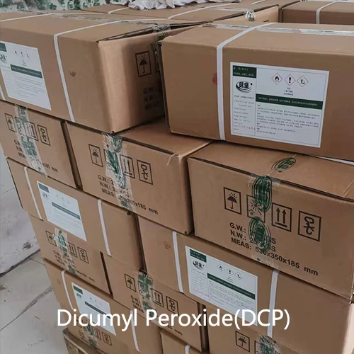 Cartoned dicumyl peroxide bags staged for loading
