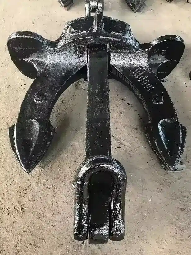 Hall anchor crown and fluke assembly