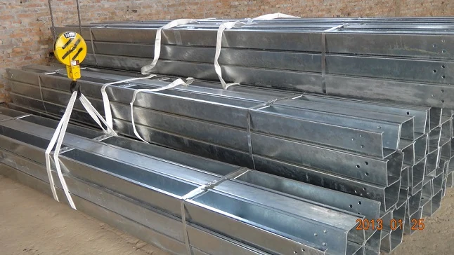 Open box beam barrier sections stacked in the Hongda finished product area