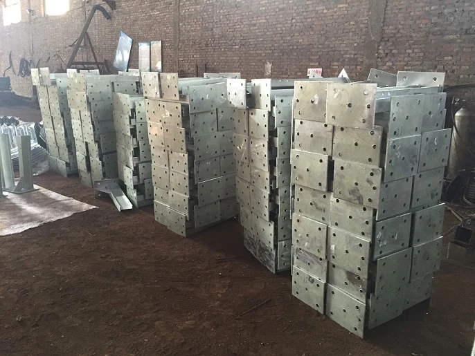 Laser cutting and punching machine shaping steel coil into guardrail post profiles