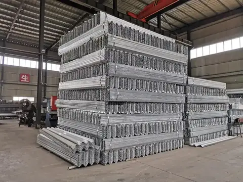 W-beam roll forming machine running steel coil into the corrugated profile