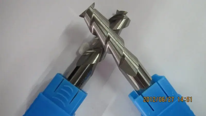 PCB milling cutters held in a caliper