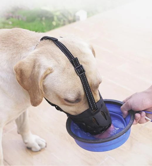 Side view of soft rubber dog muzzle showing the reflective strip and clip