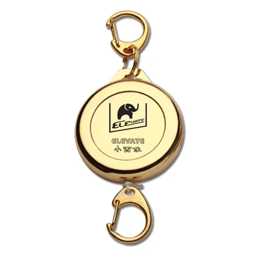 Metal ELEVATE retractable ski pass holder in gold with metal hook and belt clip