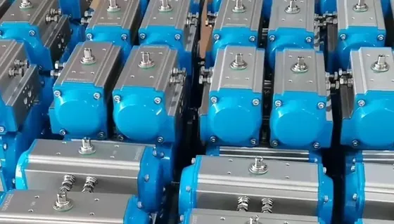 Pneumatic valve actuator bottom view showing valve stem drive pinion and mounting bolt holes