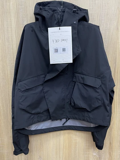 DM01 outerwear garment in 100% cotton with PU-membrane and carbon brushed terylene inner