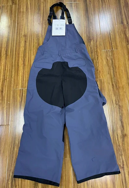 DM02 ski pants with side zippers and reinforced seat and knee areas