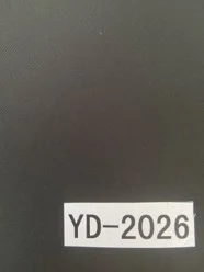 Close-up of YD-2023 fabric surface showing twill weave and PU coating