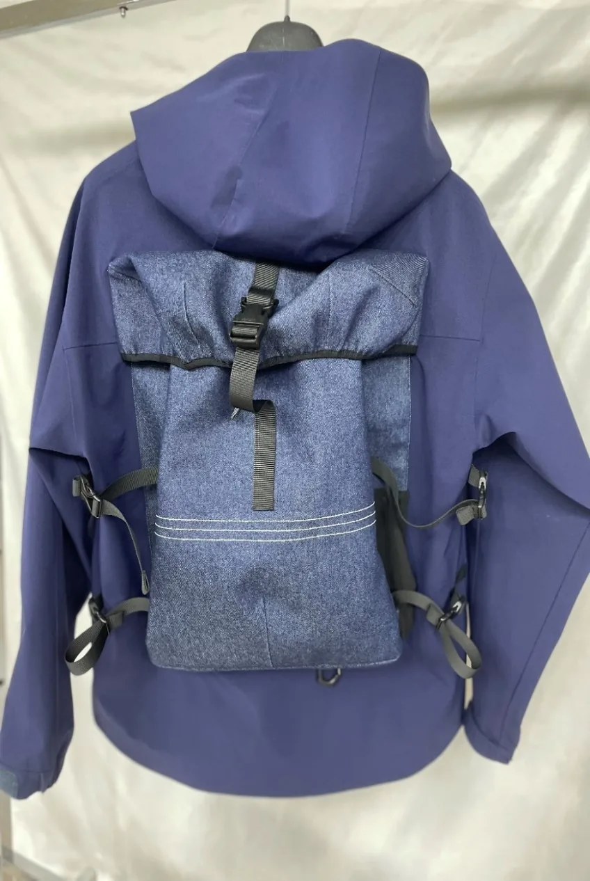YD-708-2 jacket back view with taped seams and hood