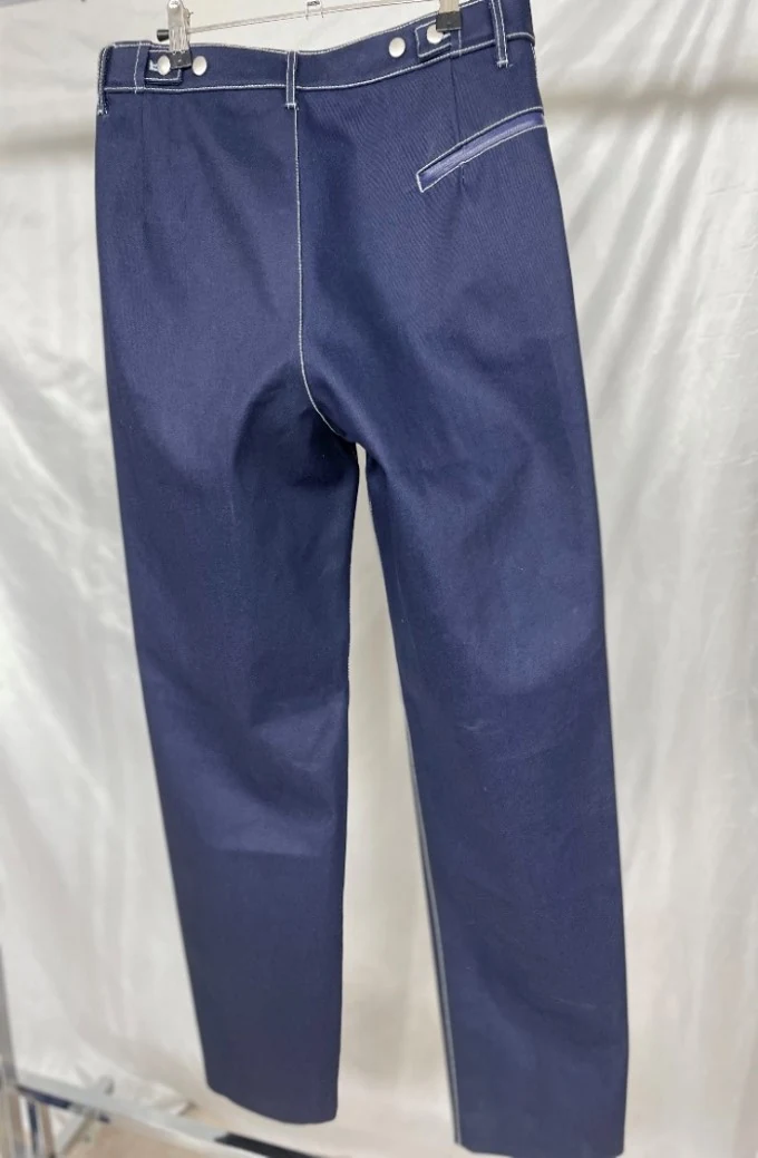 Close-up of YD-716 jeans showing coated shell and PU mid layer construction