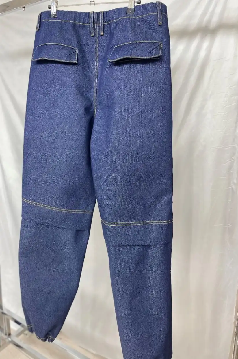 Close-up of YD-726 jeans showing layered construction and DWR finish