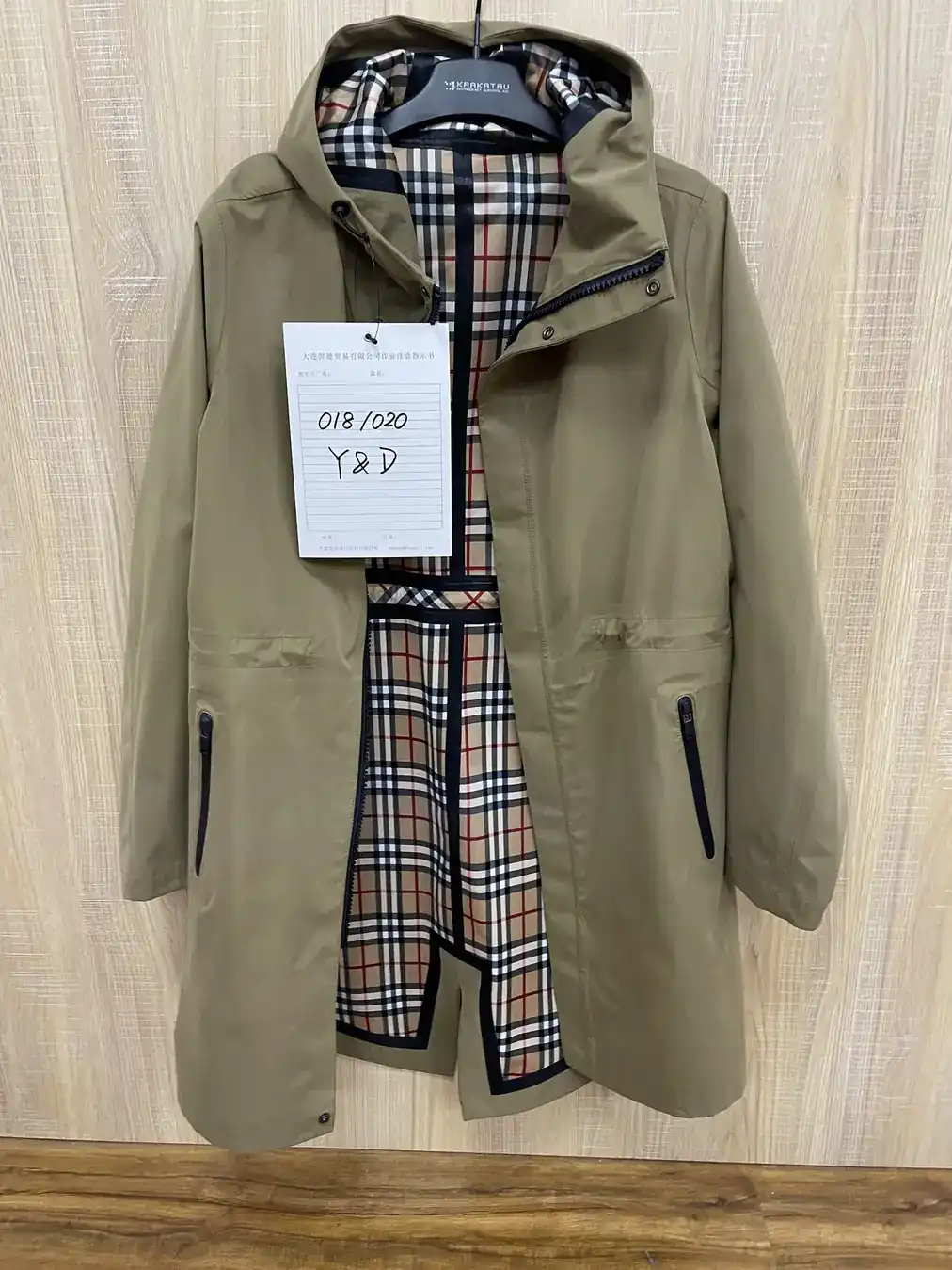 YD018 lightweight outerwear fabric with nylon outer layer, PU membrane, and classic lattice cloth backing