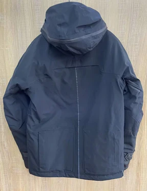 Close-up of YD298 outer fabric with DWR finish and USB heater port