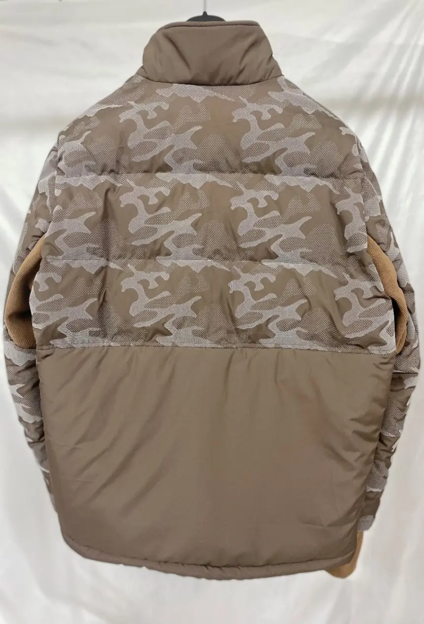 Close-up of YD-801-1 jacket showing 3D print pattern and underarm knitting fabric detail