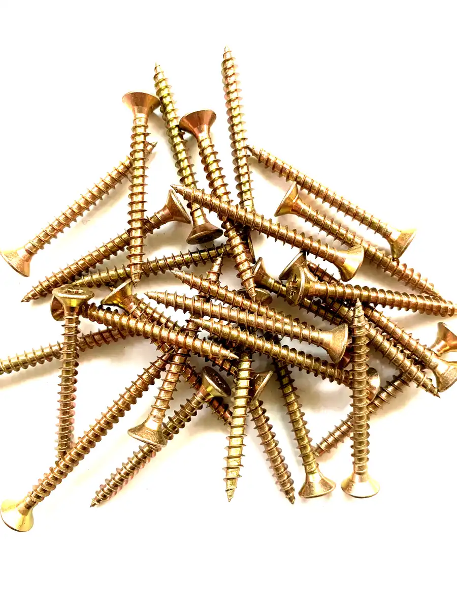 Close view of the ribbed underhead on a yellow zinc chipboard screw