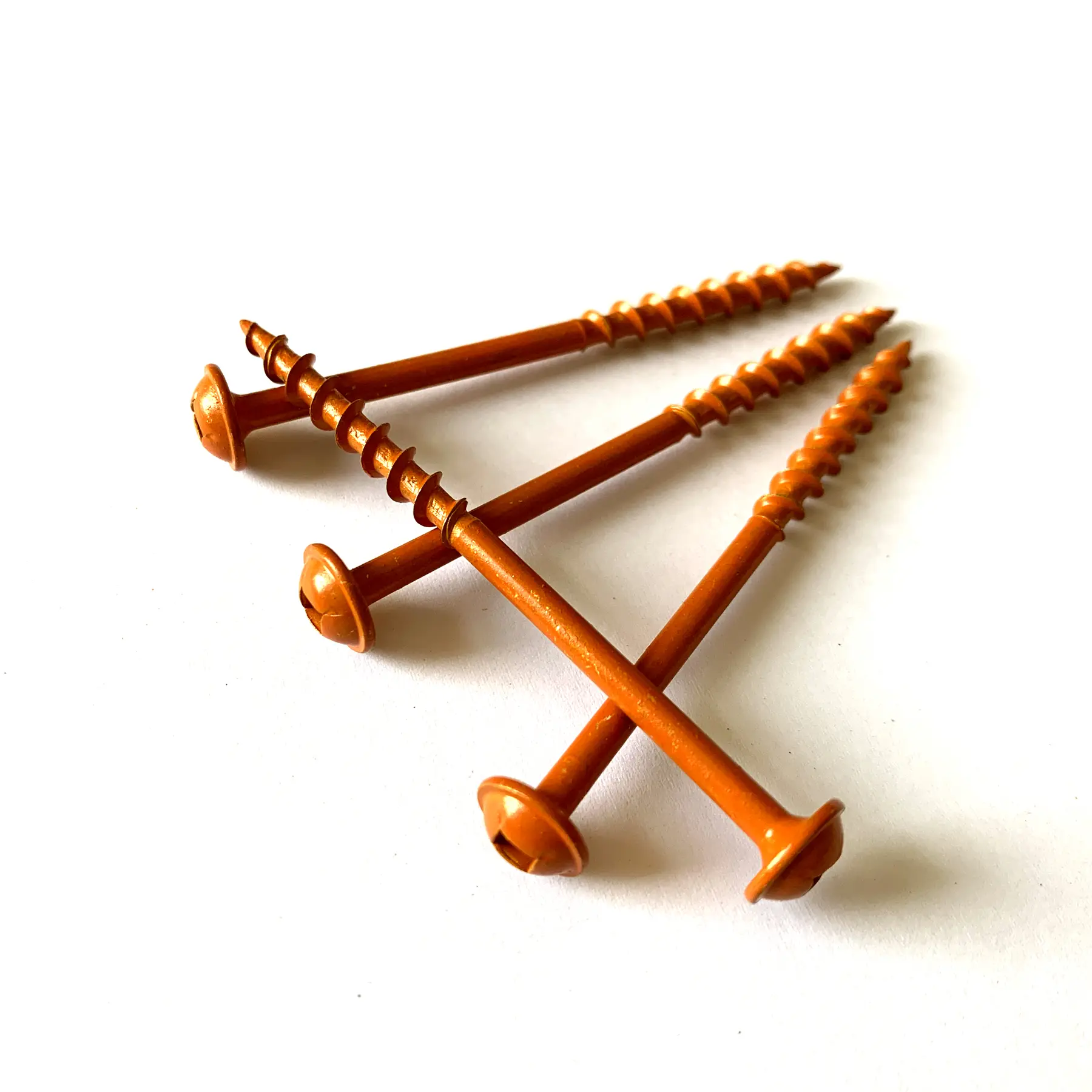 Copper coated square drive chipboard screws with serrated countersunk heads