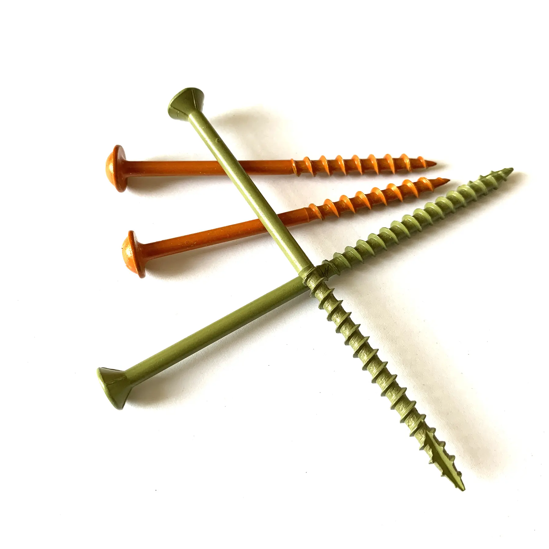 Close view of the serrated thread on a copper coated chipboard screw