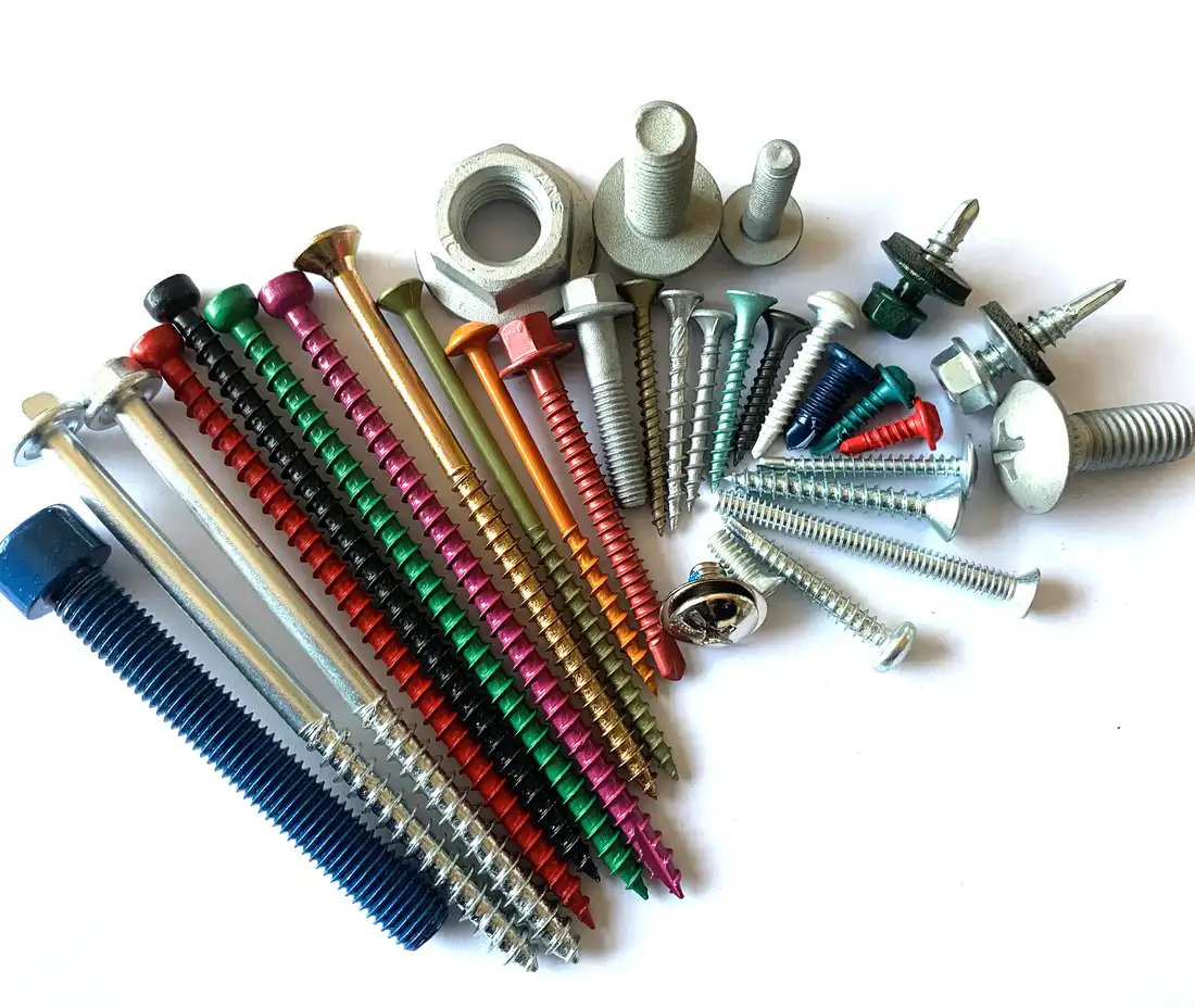 Copper toned square hole chipboard screws arranged in a fan