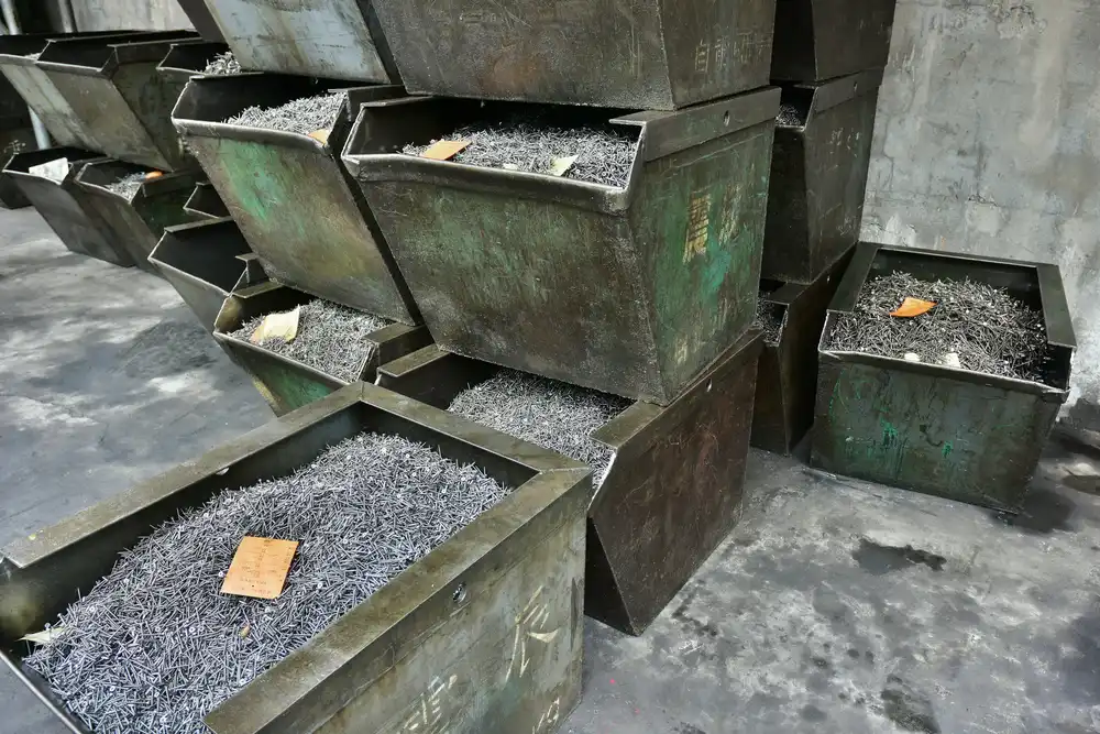 Wire stock staged in the materials area of the factory