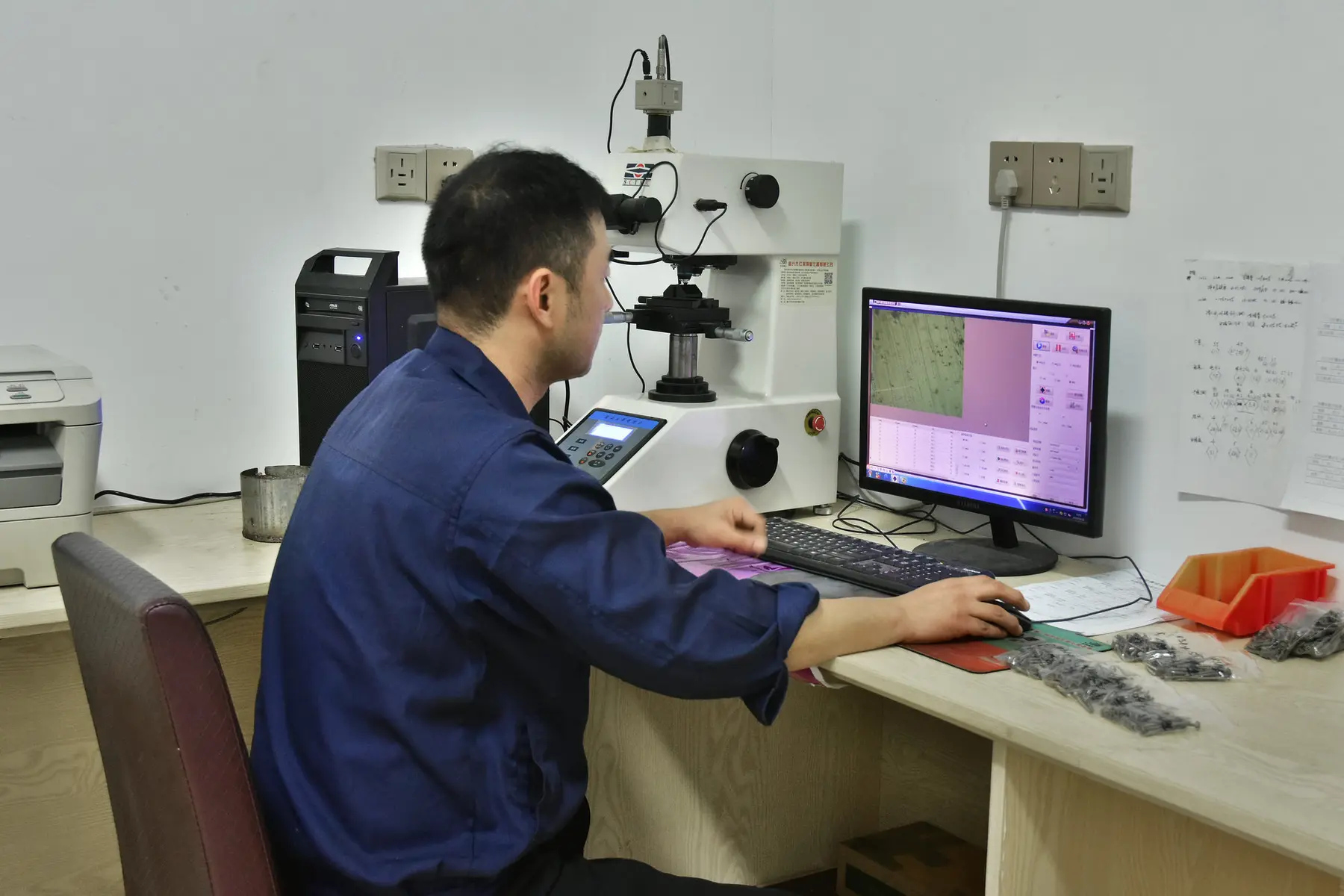 Sorted fastener samples held for dimensional checking