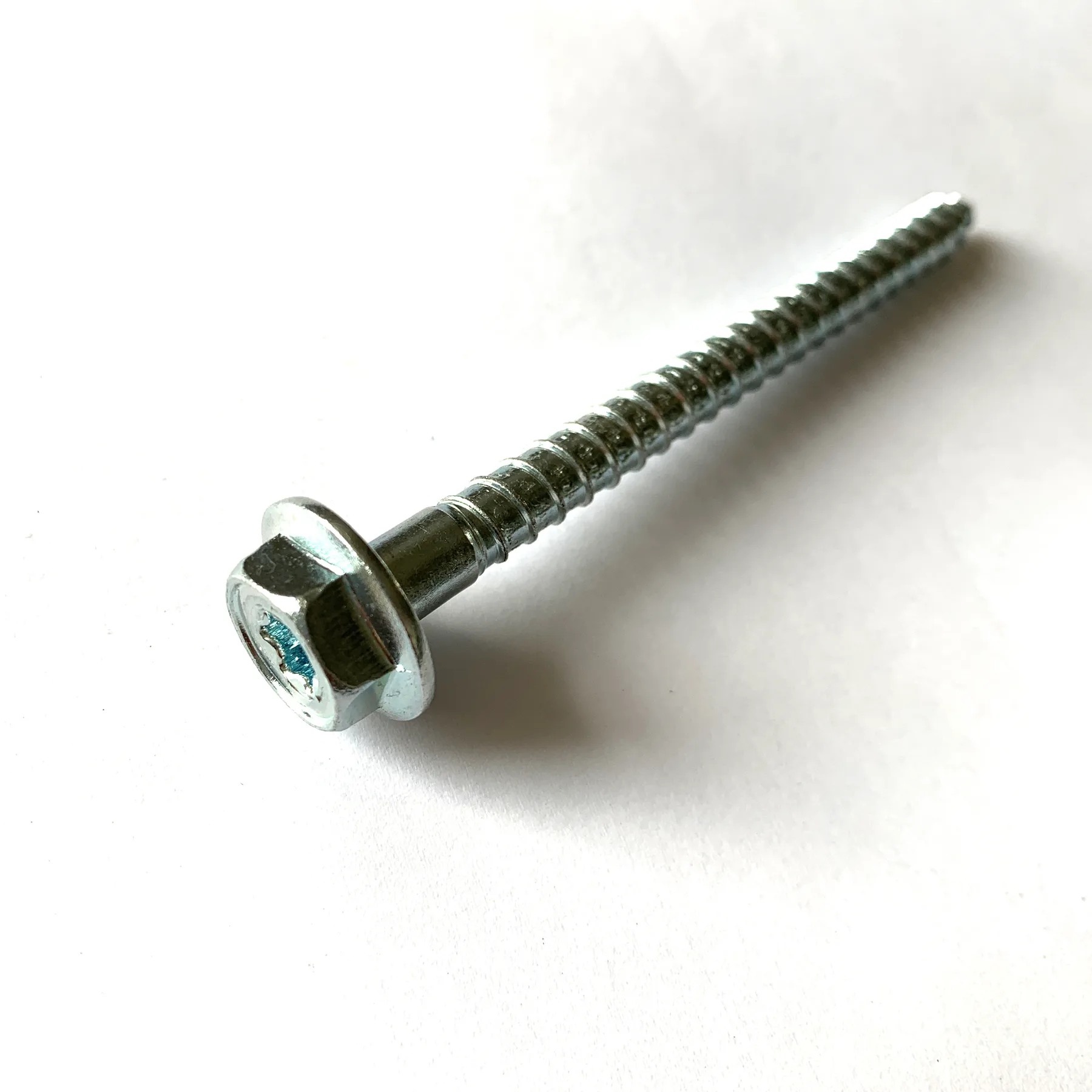 Hexagon head wood screw with Torx recess in an olive coloured finish